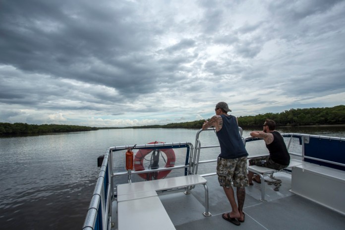 men on a tour boat in chokoloskee bay