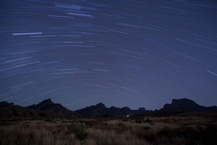 stars over the chisos basin in big bend national park, texas