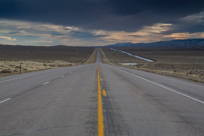 dramatic clouds and road, south pass