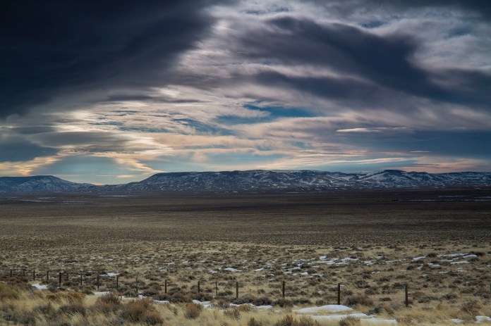 dramatic clouds and road, south pass