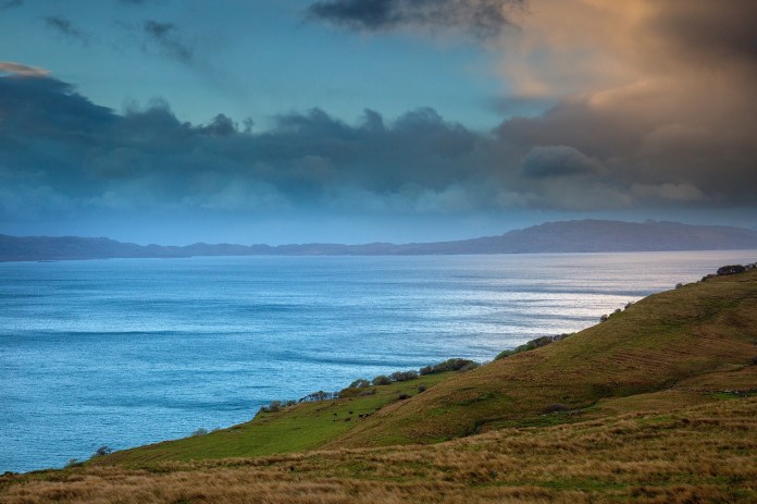 Dramatic light and clouds and the Isles of Rona and Raasay from the Isle of Skye