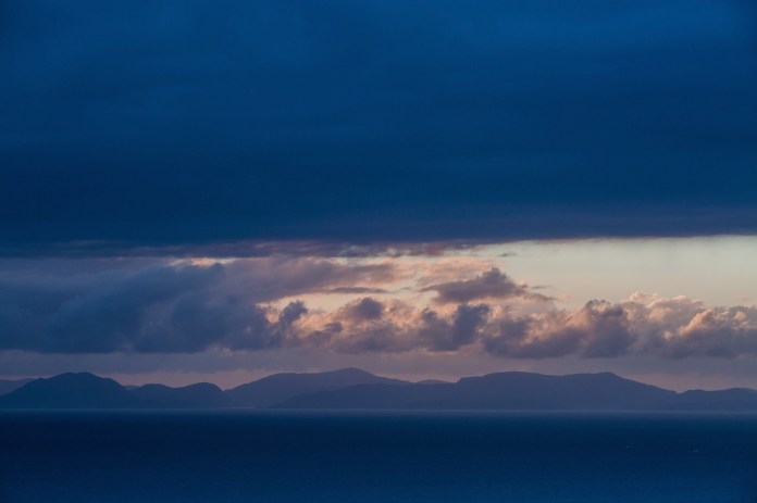 A dramatic sunset over he Isle of Harris from Rubha Hunish