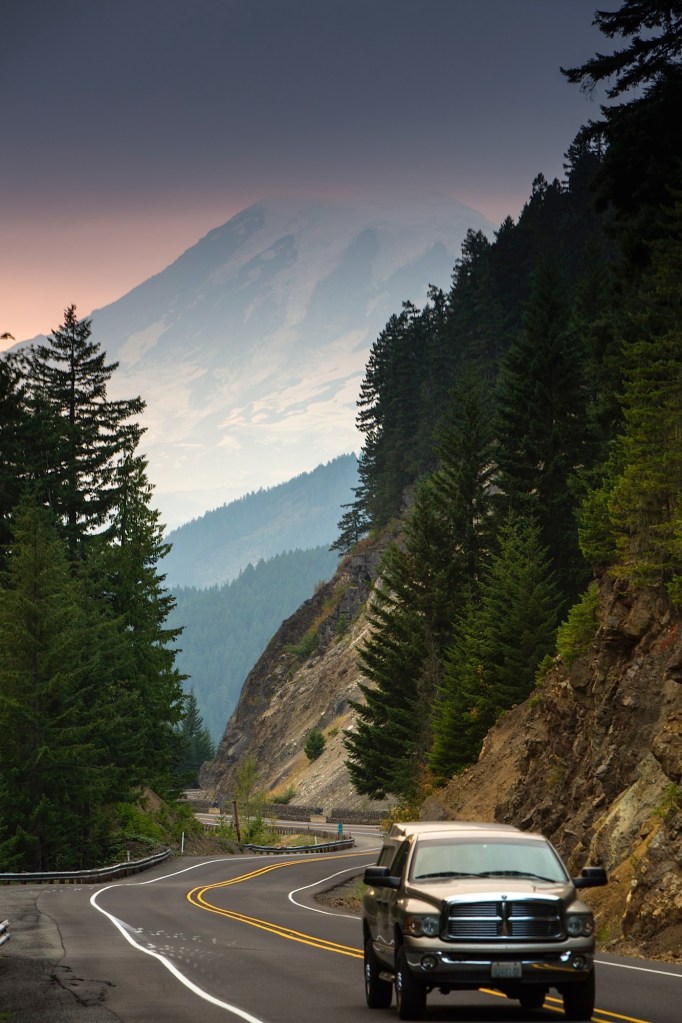 sunset over mount rainier with wildfire smoke