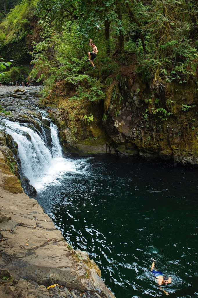 Cliff jumping at Punchbowl Falls