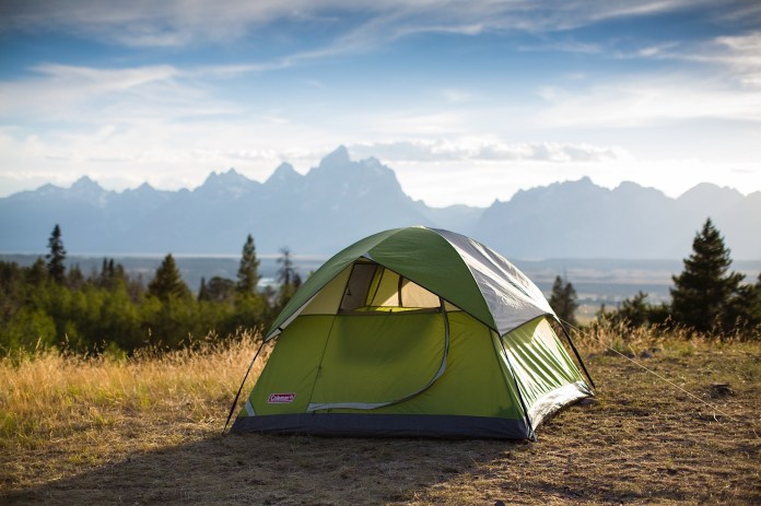 Coleman tent with Tetons in the background