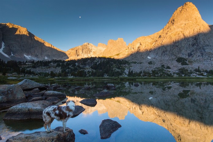 Reflections of Pingora Peak and the Cirque in Lonesome Lake at dawn