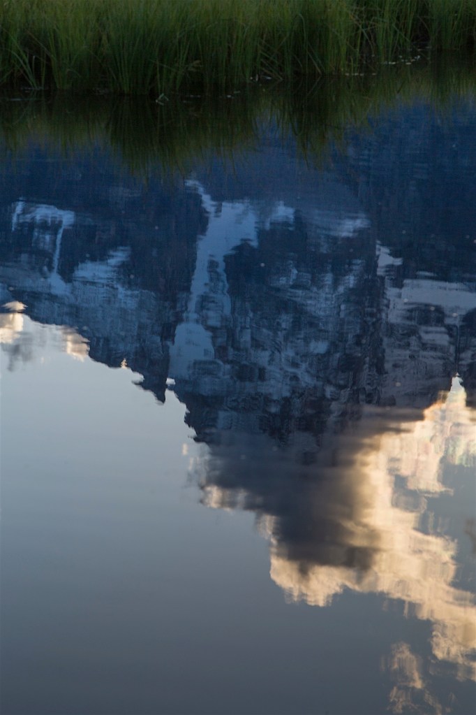 Dramatic clouds loom over Swabachwers Landing in Grand Teton National Park