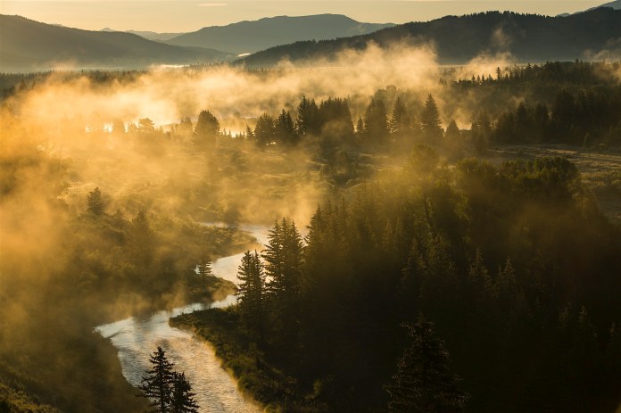 Fog rising from the Snake River in the morning